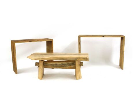 A graduated pair of driftwood side tables, the rectangular tops, on panelled ends, 103 wide, 36cm deep, 76cm high and 88cm wi