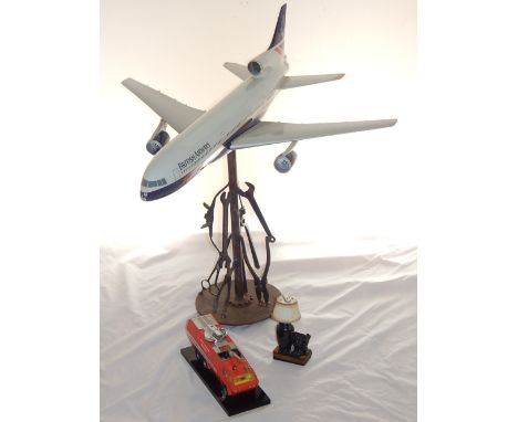 Travel agents model British Airways TriStar aircraft on associated stand together with fire tender table lighter and another 