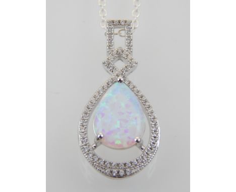 A silver, cubic zirconia and opal set pendant necklace, on a silver chain. 