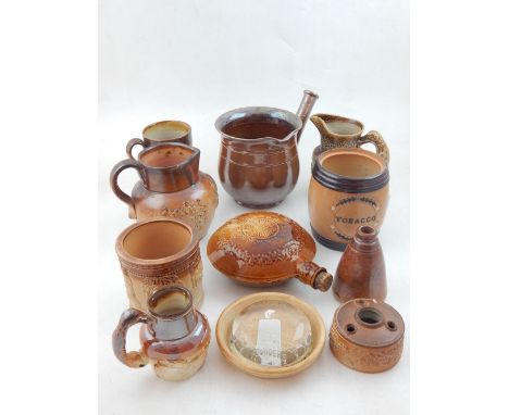 A Victorian salt glazed pottery skillet and cup together a collection of assorted Victorian glazed earthenware to include a t
