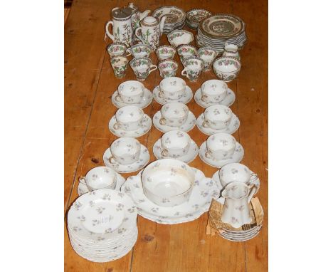 An early 20th century Limoges porcelain 41 piece part tea service, decorated with mauve flowerheads, together with a Coalport