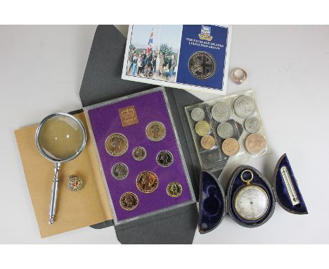 A 1970 coinage proof set, a gilt pocket barometer in case with thermometer, a Masonic gilt metal ring marked 18k, other coins