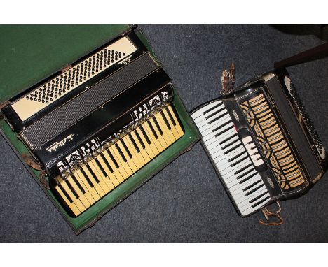 An Estrella cased accordion and another accordion (without case)