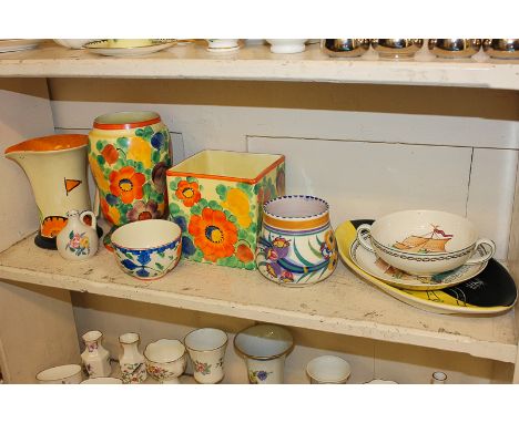 A Myott & Son Art Deco jug, a Wedgwood two-handled cup and saucer showing a ship in full sail, two pieces of Poole pottery an