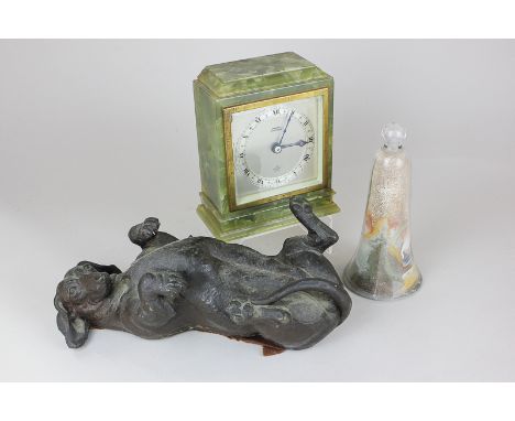An Art Deco Elliott onyx mantel clock marked Dimmer Southsea, a bronzed ornament of a dachshund and a glass sand ornament fro