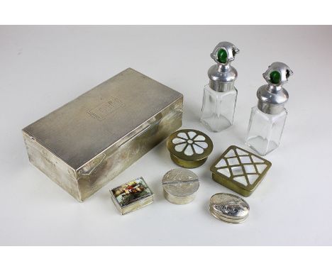 A George V silver cigarette box, three Continental silver snuff boxes, all marked 925, two mother of pearl decorated dressing