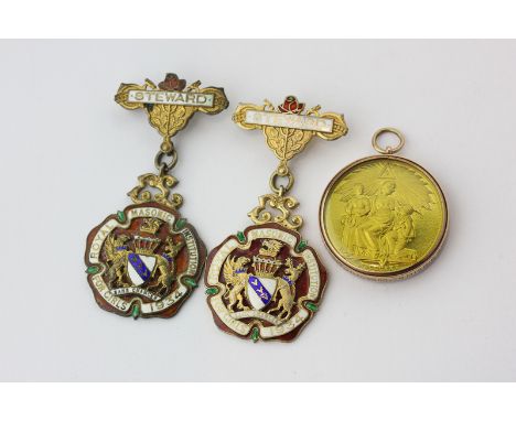 Two silver gilt and enamel Masonic pendants on bars; a gilt Masonic medal in gold mount