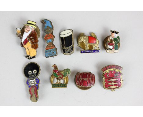 A small collection of metal and enamel advertising badges including Guinness, Courage and Watneys Red Barrel (9)