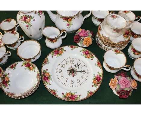 A Royal Albert Old Country Roses part tea set comprising a teapot, sugar bowl and milk jug, eleven various cups, thirteen var