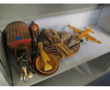 Treen items to include carved birds and a ceramic horse pulling a wooden cart