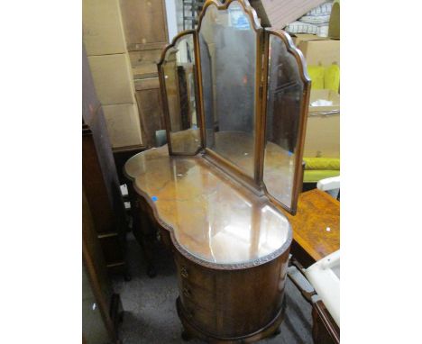 A quarter cut, walnut veneered dressing table with triple mirror, bevelled plate, standing on cabriole legs and a gentleman's