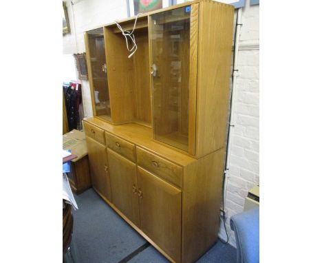 A large modern Ercol light elm display cabinet, 72 3/4 h x 61 1/4 w