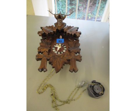 A modern German Black Forest cuckoo clock, 12 1/2 h