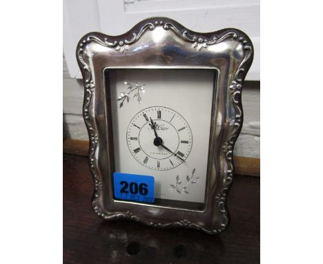 A Carr's Millennium silver clad dressing table clock, London 2000, 5 6/8 x 4 2/8