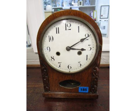 An early 20th century oak cased mantel clock, white enamel Roman dial with German movement, 11 high, with key and pendulum