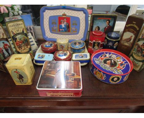 A selection of Metal Box Company commemorative and whisky advertising biscuit and whisky bottle tins to include a Highland Re