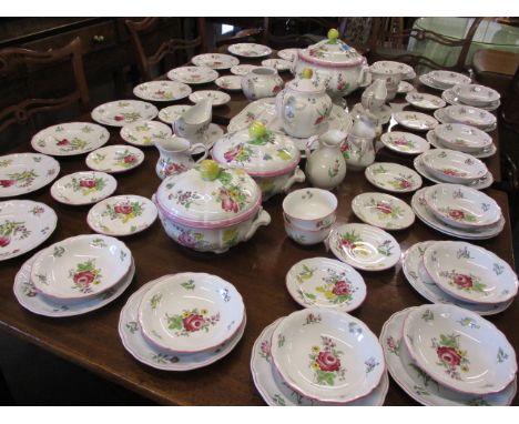 A Spode part dinner service, consisting of saucers, sugar bowls, plates, teapots and other items