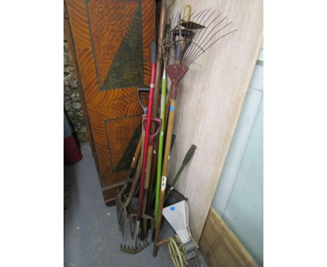 A mixed selection of vintage garden tools and a J West & Co cast iron boot scraper