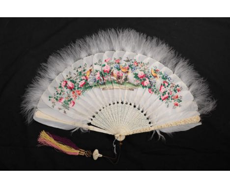 A Good Chinese Carved Ivory Fan, Qing Dynasty, the guards deeply carved, mounted with painted white feathers and tipped with 