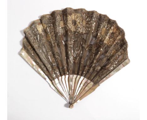 A Circa 1900 Mother-of-Pearl Fan, of an unusual taupe shade, the gorge sticks gently shaped at the shoulder but otherwise pla