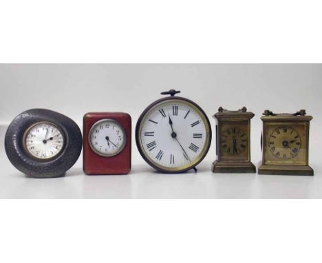 Tudric pewter 01423 easel clock and four other small clocks. Condition report: see terms and conditions