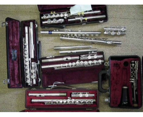 Four flutes by Buffet, Boosey and Hawkes, Jupiter, a part flute and part of a Boosey and Hawkes clarinet. Condition report: s