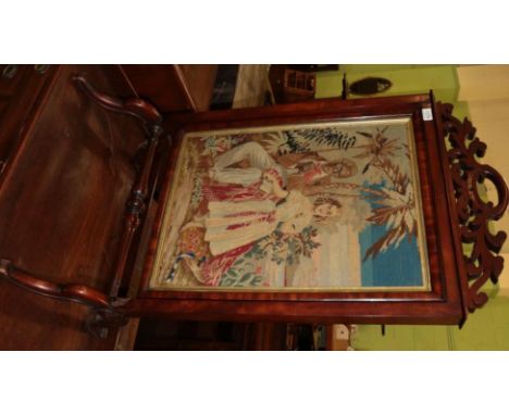 A Victorian woolwork firescreen, detachable and in decorative mahogany frame 
