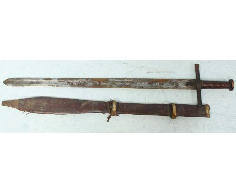 A late 19th or early 20th century Persian sword, the double edged blade with full length fuller and engraved with Arabic scri