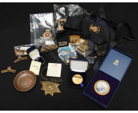 Maritime Interest. A collection of assorted militaria including brass buttons, insignia and badges, Nelson's ring, a Halcyon 