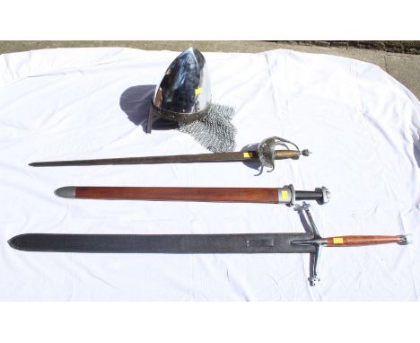 A large modern broad sword, together with two smaller modern swords and a reproduction Norman style nasal steel helmet. (4)