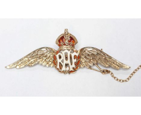 A WWII era 9ct gold RAF wings sweetheart brooch, with enamel RAF letters, wreath and crown, with safety chain. 5.9 grams