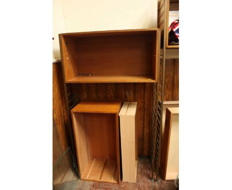 Two 'Ladderax' cabinets, one featuring an open, mirror back storage shelf, both complete with interchangeable drawers and she