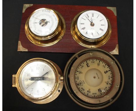 A Sestrel ships brass gimbal compass, numbered 4580, and 7405/BIIS/4580, together with a brass bulkhead clock and a modern tw