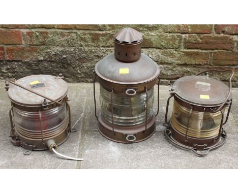 Two various copper anchor lights and a portside light. (3)
