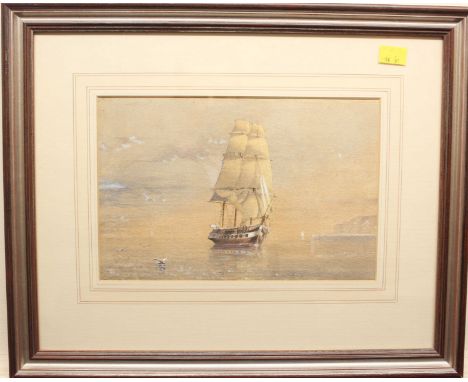 K. Browne (early 20th century) British. A tall sailing ship approaching the shore at sunset, watercolour, signed and dated '0
