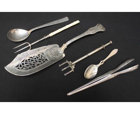 A Victorian silver fish slice, hallmarked London 1842, 7 oz., together with a pair of hammered silver glove stretchers, a Con