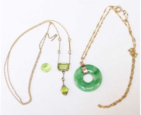 A 9ct gold and jade disc pendant, together with a green stone pendant, clasp AF. (2)