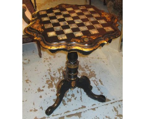 GAMES TABLE, Victorian papier maché with mother of pearl chess inlay shaped tilt action top and tripod support stamped 'Jenne