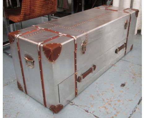 TRUNK, Aviation design metal with leather handles, rising lid above single drawer, 119cm L x 40cm D x 44cm H.  