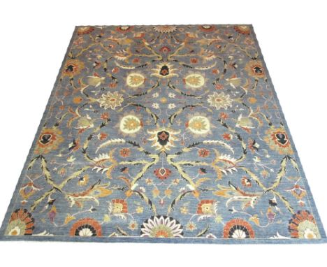 LAHORE VOYSEY DESIGN CARPET, 301cm x 254cm, allover design of palmette and foliage on an abrashed aquamarine field.