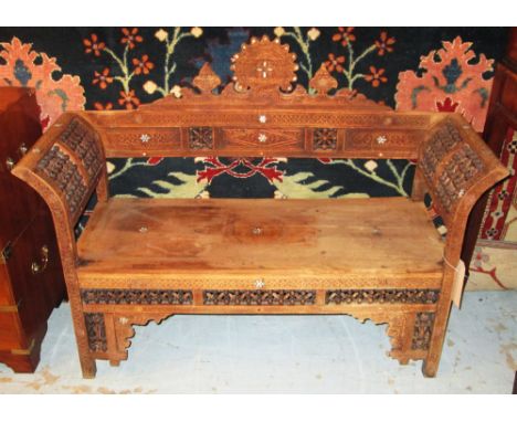 MOORISH BENCH, early 20th century Moorish carved hardwood with mother of pearl and ebony inlay, 116cm W.