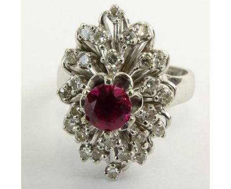 Vintage Round Cut Ruby, Round Cut Diamond and 18 Karat White Gold Ring. Signed 18K. Good vintage condition. Ring size 7-1/2. 