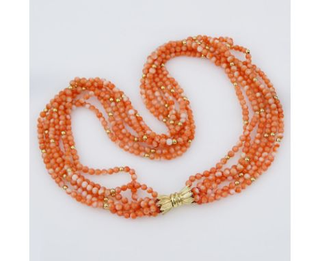 Vintage Six Strand Coral Bead and 14 Karat Yellow Gold Necklace. Stamped 14K. Coral beads measure 4mm. Very good condition. M