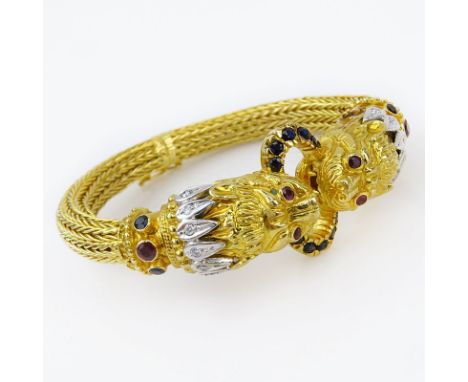 Ilias Lalaounis, Greek 18 Karat Yellow Gold Lion Head Bracelet with Diamond, Sapphire and Ruby Accents. Signed to clasp. Very