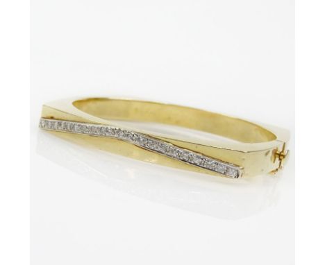 Vintage 14 Karat Yellow Gold and Diamond Hinged Bangle Bracelet. Stamped 14K. Minor dings and surface wear. Measures 1/4" W, 