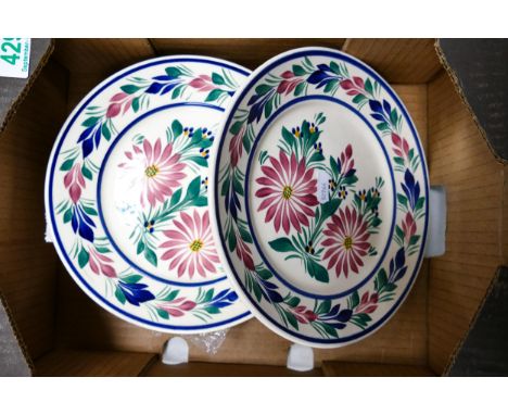 Four Quimper Hand decorated wall plates 