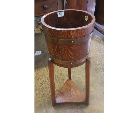 R. A. Lister &amp; Co Ltd oak planter in coopered barrel form, height 67cm. 