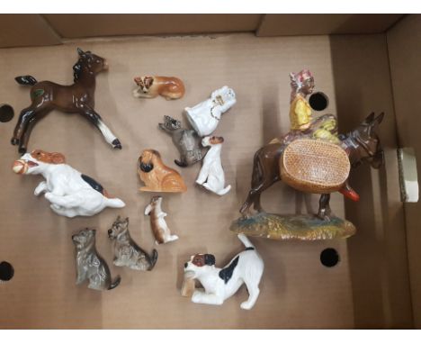 A collection of Beswick and Royal Doulton figures to include Royal Doulton character Dogs and K series Dog Figures together w