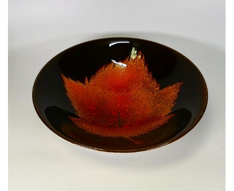 Poole pottery bowl with a leaf design.Diameter 26.5cm 