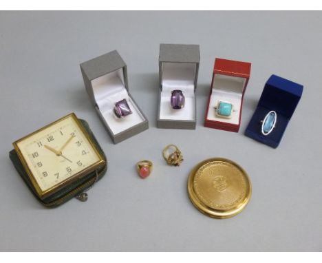 DANIEL SWAROVSKI SILVER RING SET WITH A PURPLE STONE, SIMILAR RING, ANOTHER SWAROVSKI RING, ALL CASED, THREE OTHER RINGS, A C